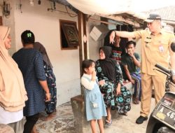 Pj Bupati Tangerang memulai program untuk merapikan kampung Tanjung Kait.