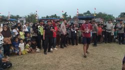 Bhabinkamtibmas Desa Mekar Jaya Bripka Habibi Bersama Personel Polsek Panongan Amankan Turnamen Piala Bergilir KADES CUP 2026